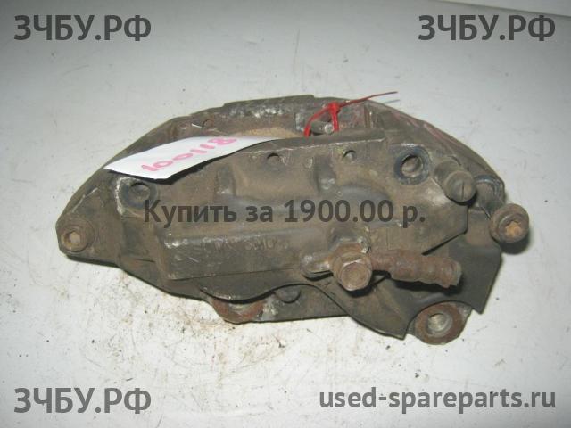 Lexus LS (2) 400 Суппорт передний левый (в сборе со скобой)