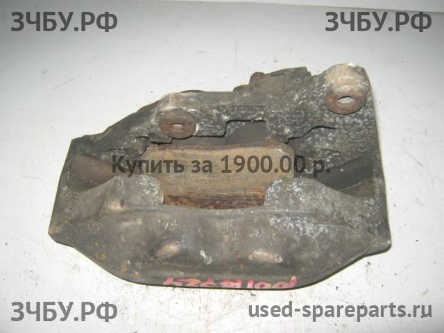 Lexus LS (2) 400 Суппорт передний левый (в сборе со скобой)