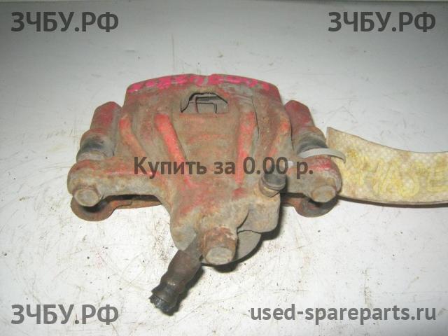 Toyota Chaser 6 (ZX 100) Суппорт задний левый (в сборе со скобой)