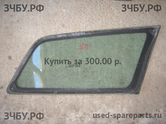 Ford Focus 1 Стекло кузовное глухое левое