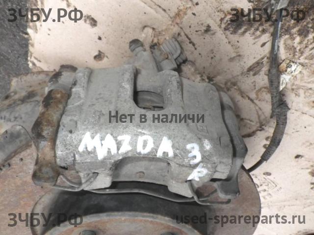 Mazda 3 [BK] Суппорт задний правый (в сборе со скобой)