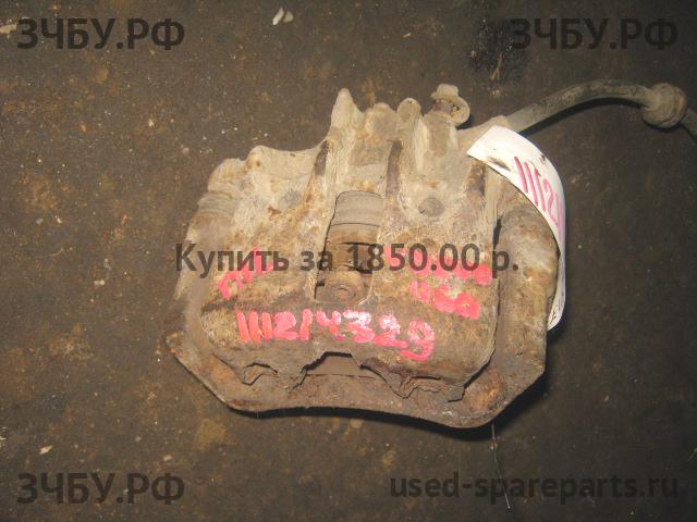 Volvo 460 Суппорт передний левый (в сборе со скобой)
